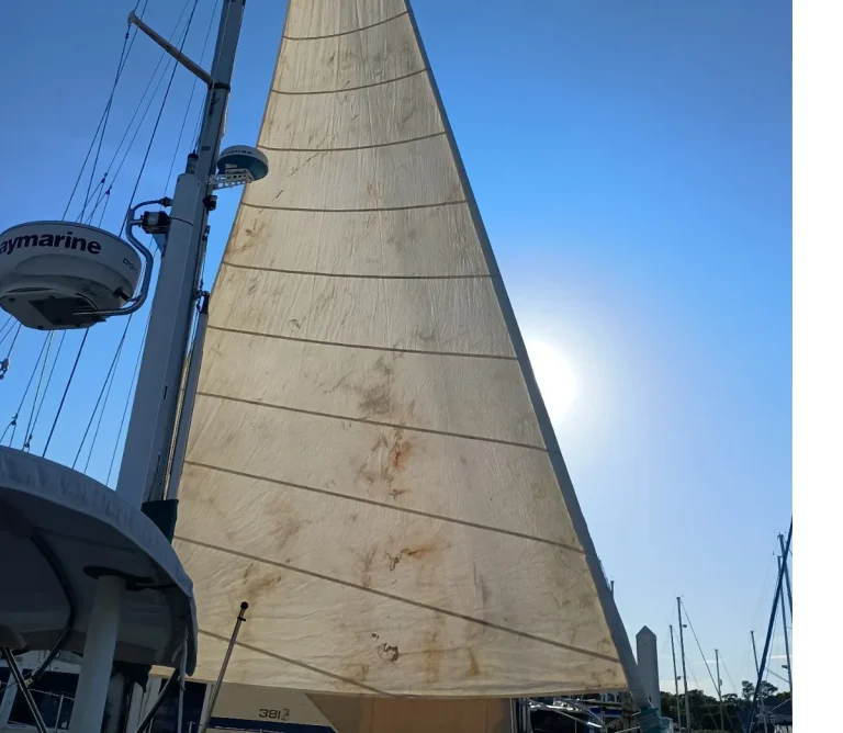 A 3DFurler with a teal drum fitted to the forestay of an older sailboat
